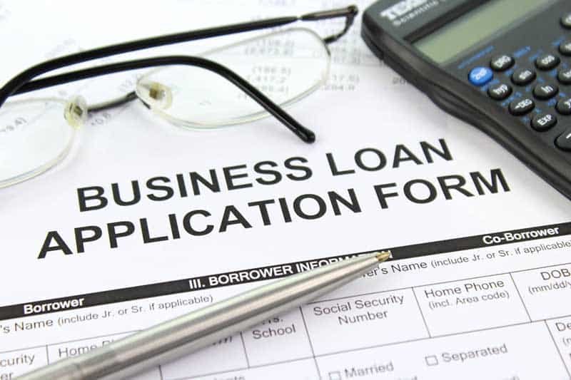 image Total new loans, bounced cheques fall