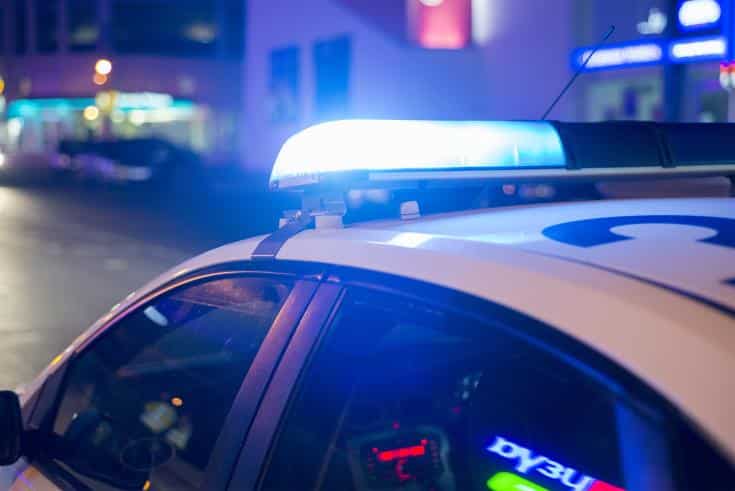image Car overturns in ditch, driver removed by fire department