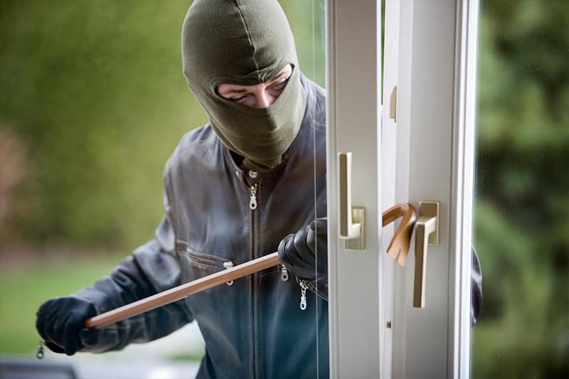 image Five people break into house, attack family