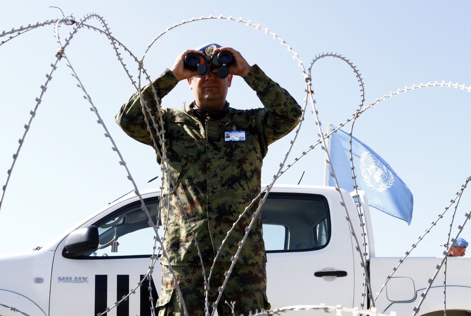 image Unficyp closely watching Turkish works in Dherynia