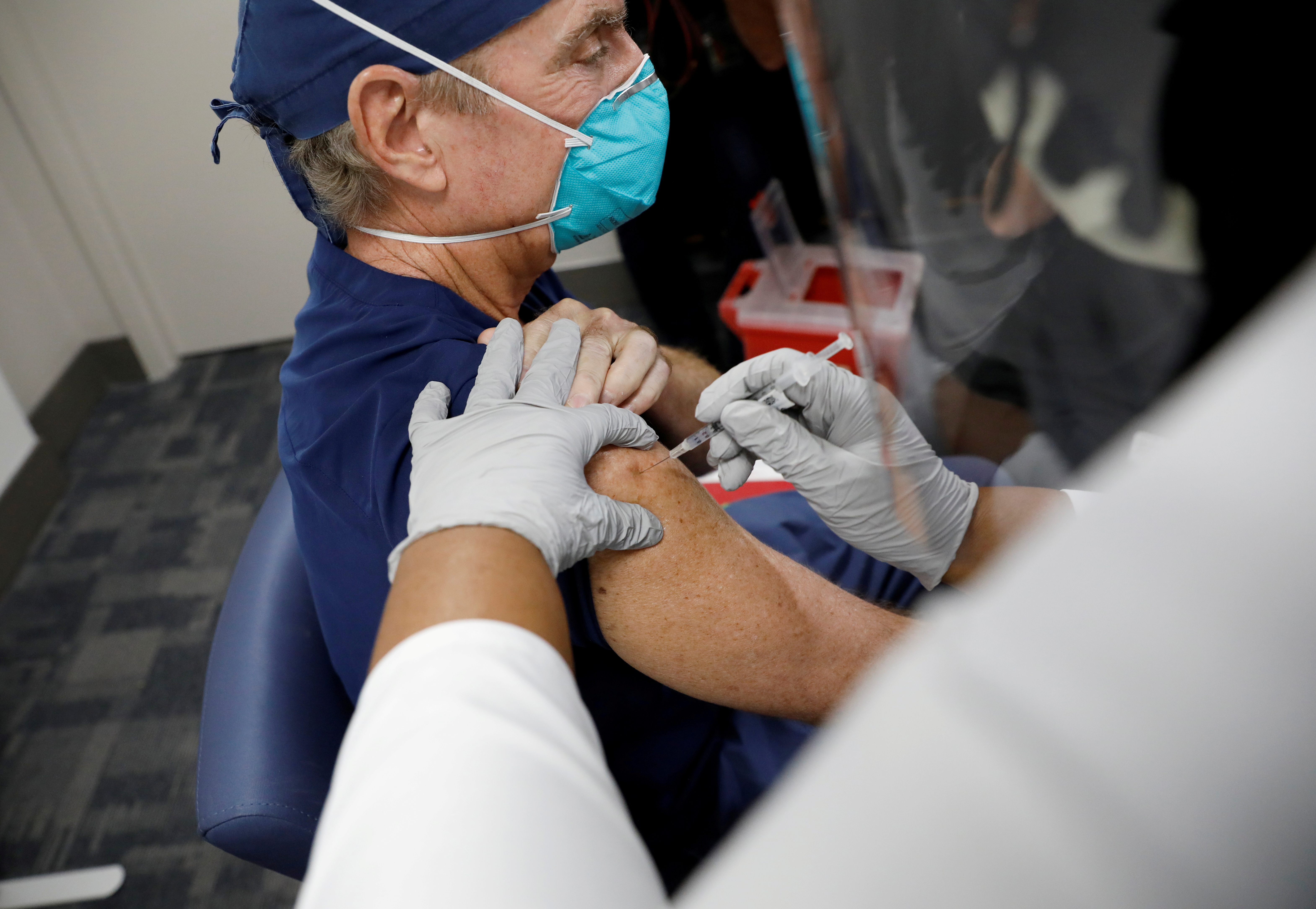 image Most U.S. Covid-19 vaccines go idle as New York, Florida move to penalize hospitals