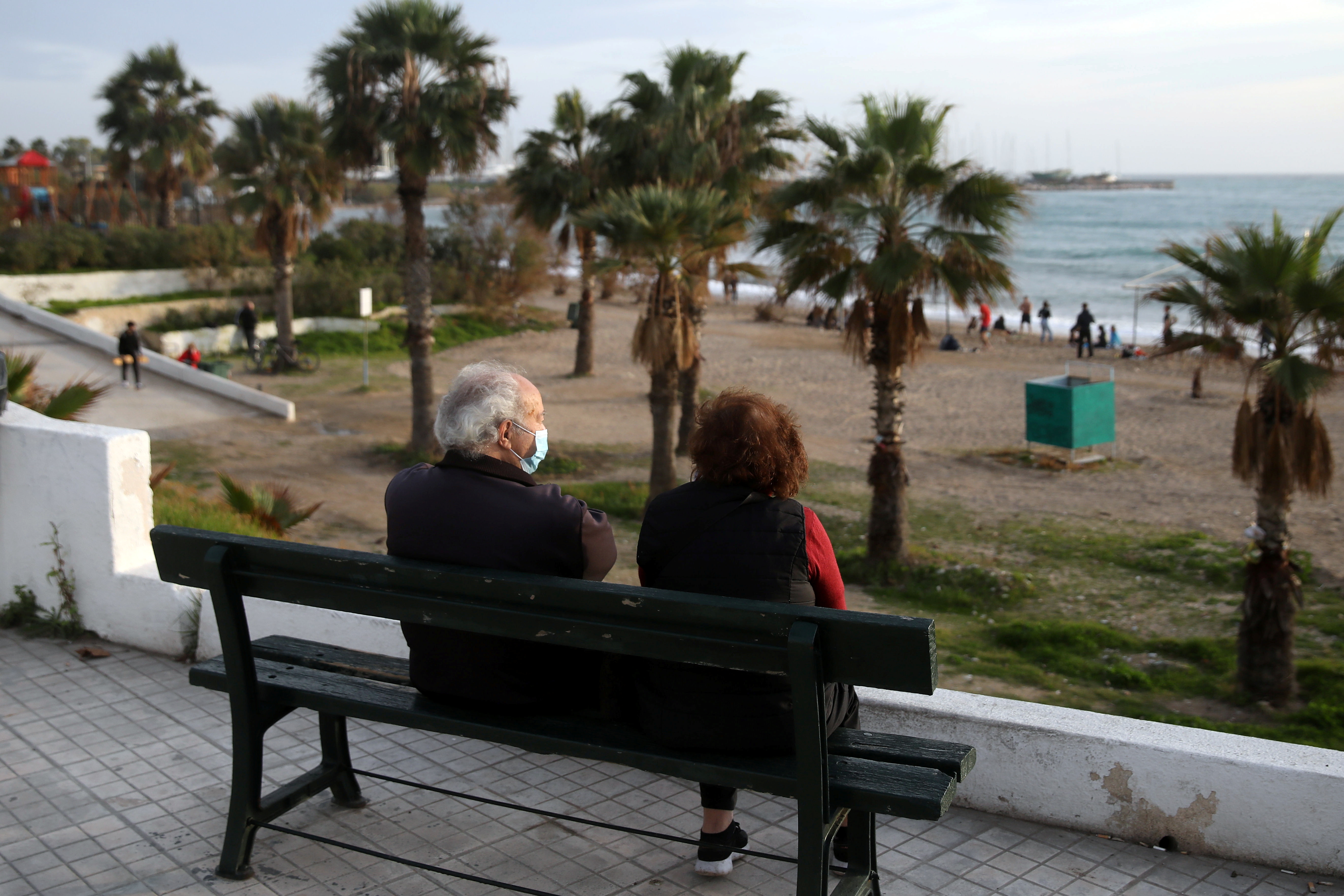 image Greeks escape lockdown for the beach as winter temperatures soar