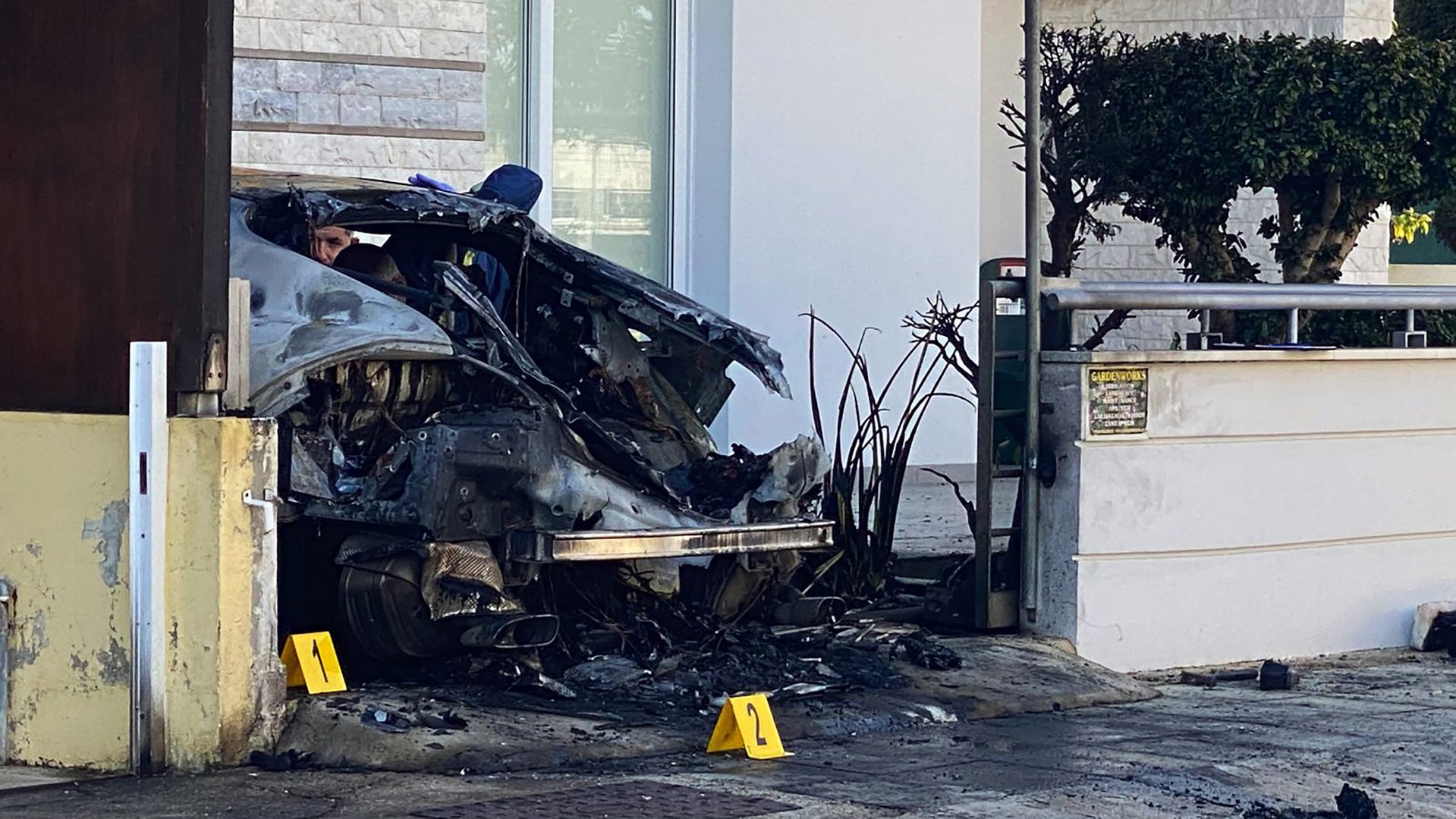 image Luxury car destroyed by arson