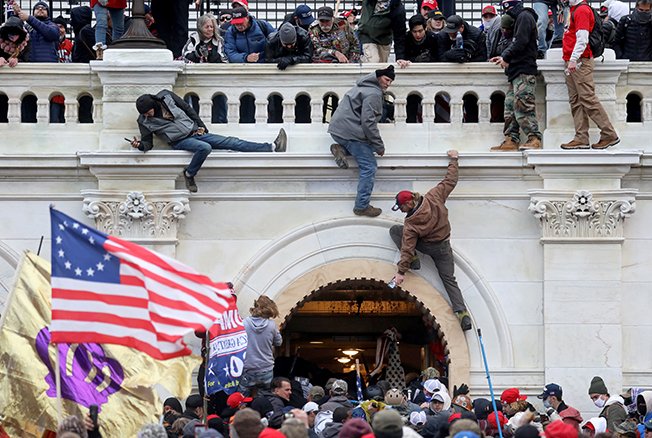 image US says more than 300 people charged to date over Capitol riots