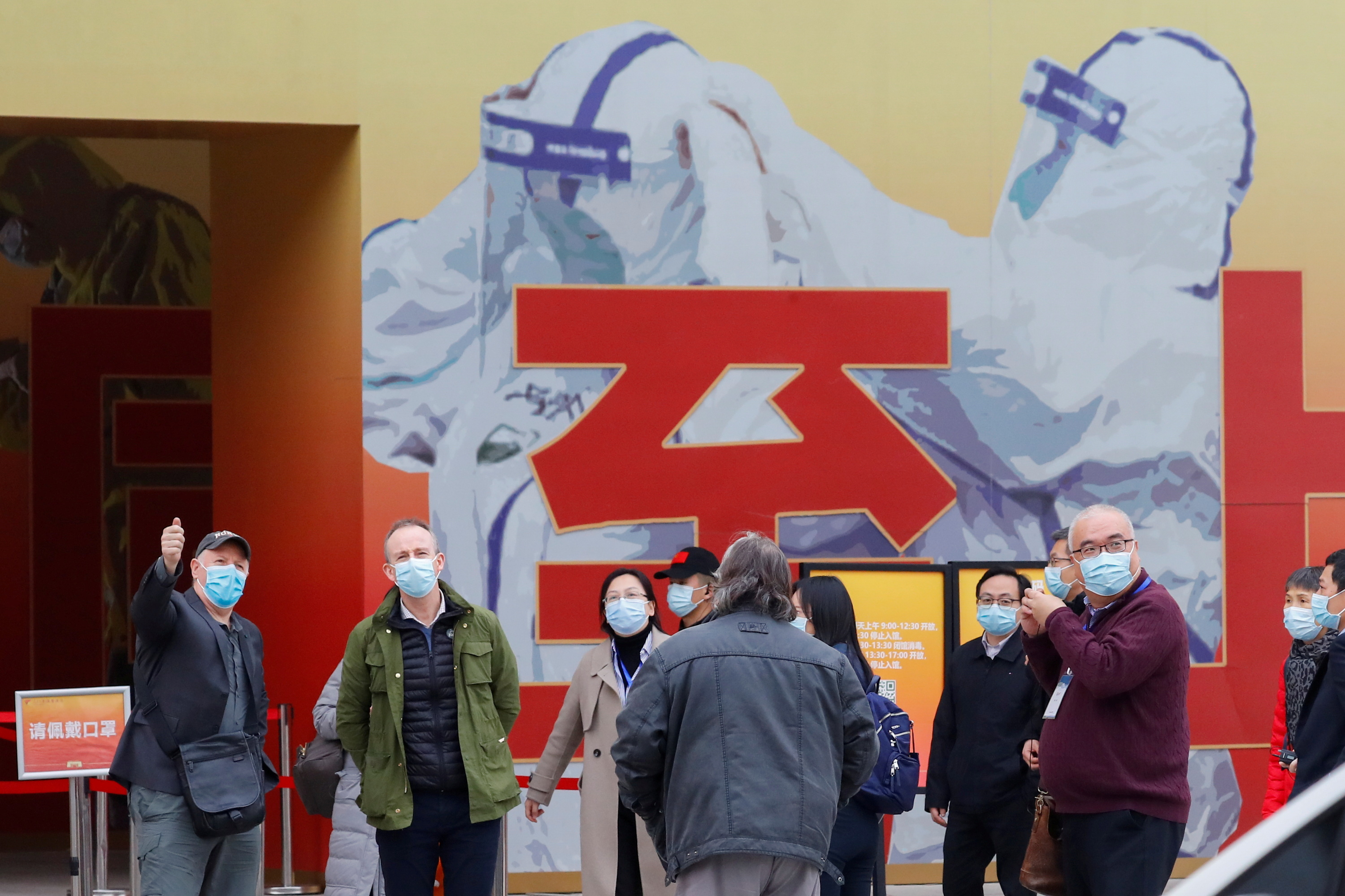 image WHO team, on tightly controlled China mission, visits hospital