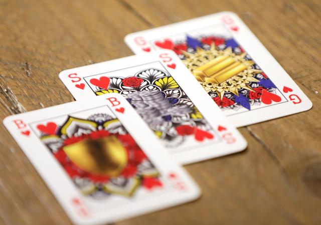 image King toppled from throne by gender-neutral card deck