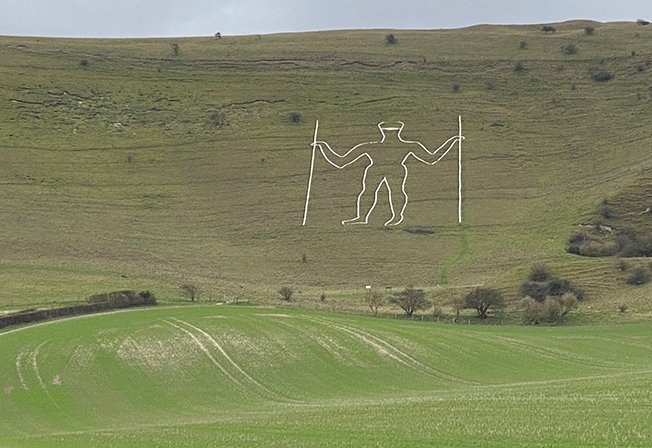 image Covid face mask painted on giant English chalk figure