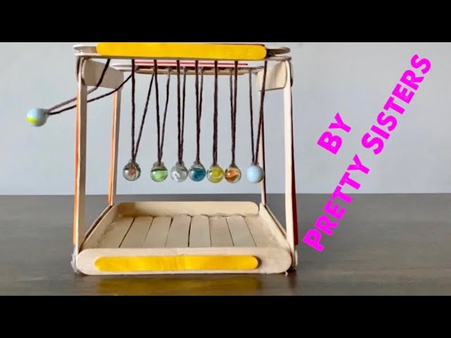 image How to make a Newton&#8217;s Cradle with marbles