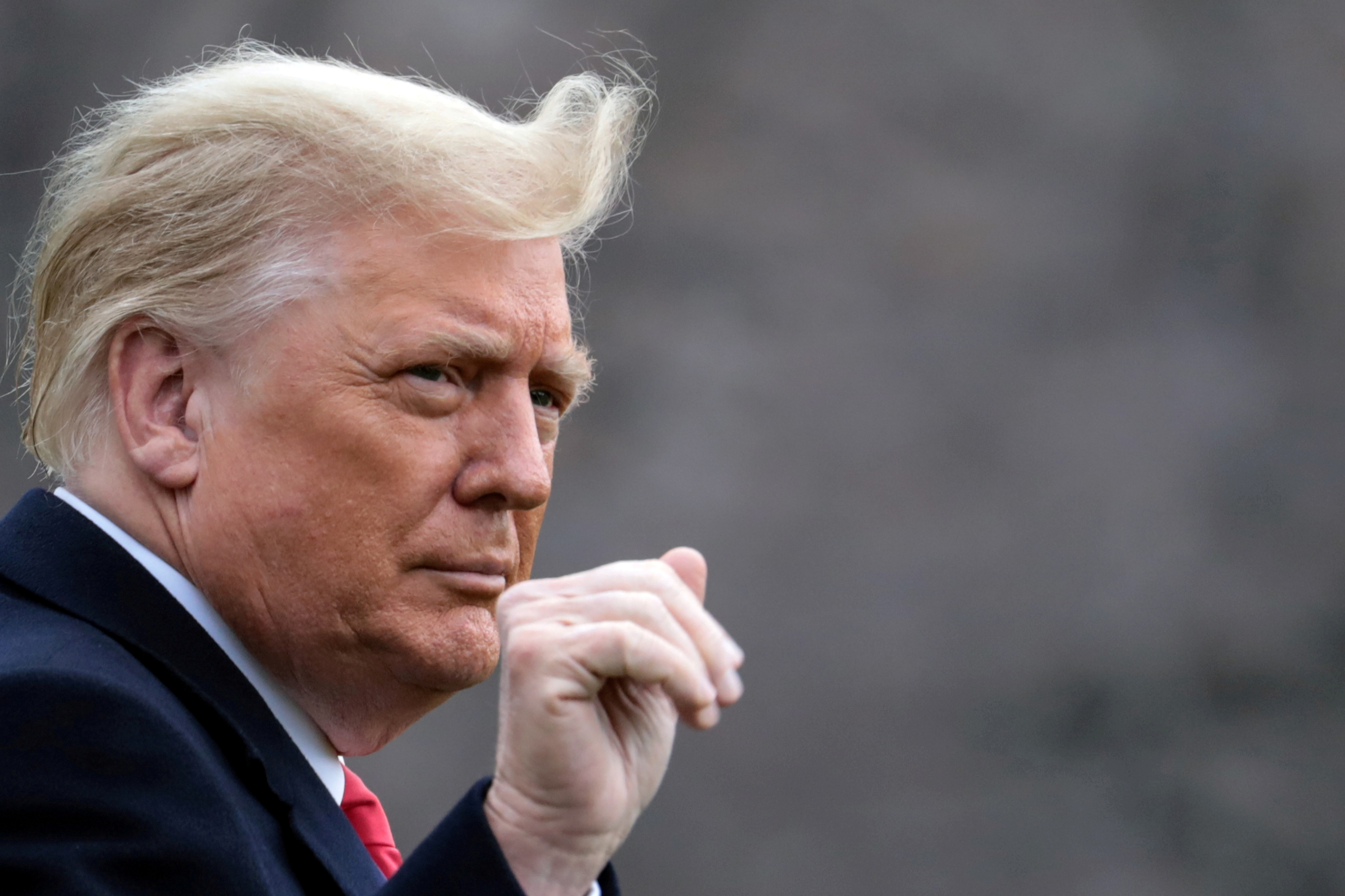 image Trump ally Perry sues to block US from searching seized cellphone