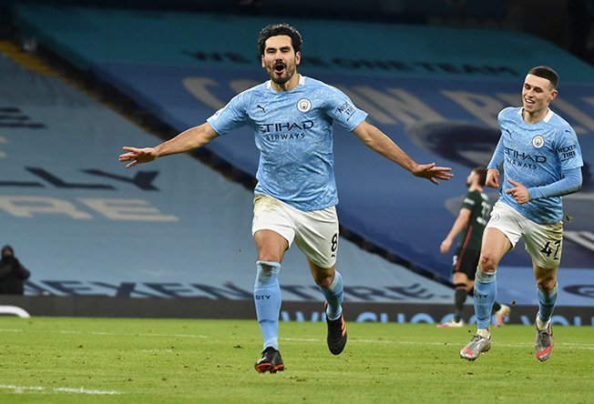 image Gundogan strikes again as Man City sink Spurs