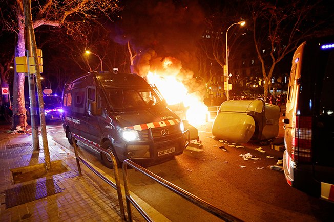 image Barricades burn in Spanish streets amid protests over jailed rapper