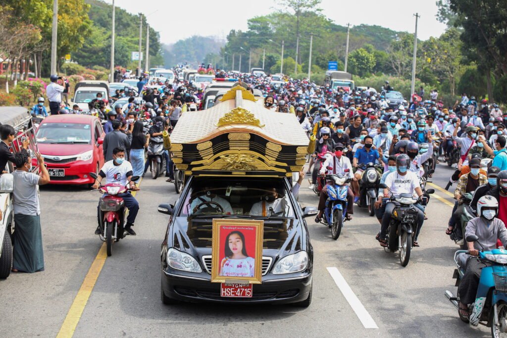 a young woman protester's funeral who was shot in the head in naypyitaw when police tried to disperse a crowd during protests against the military coup