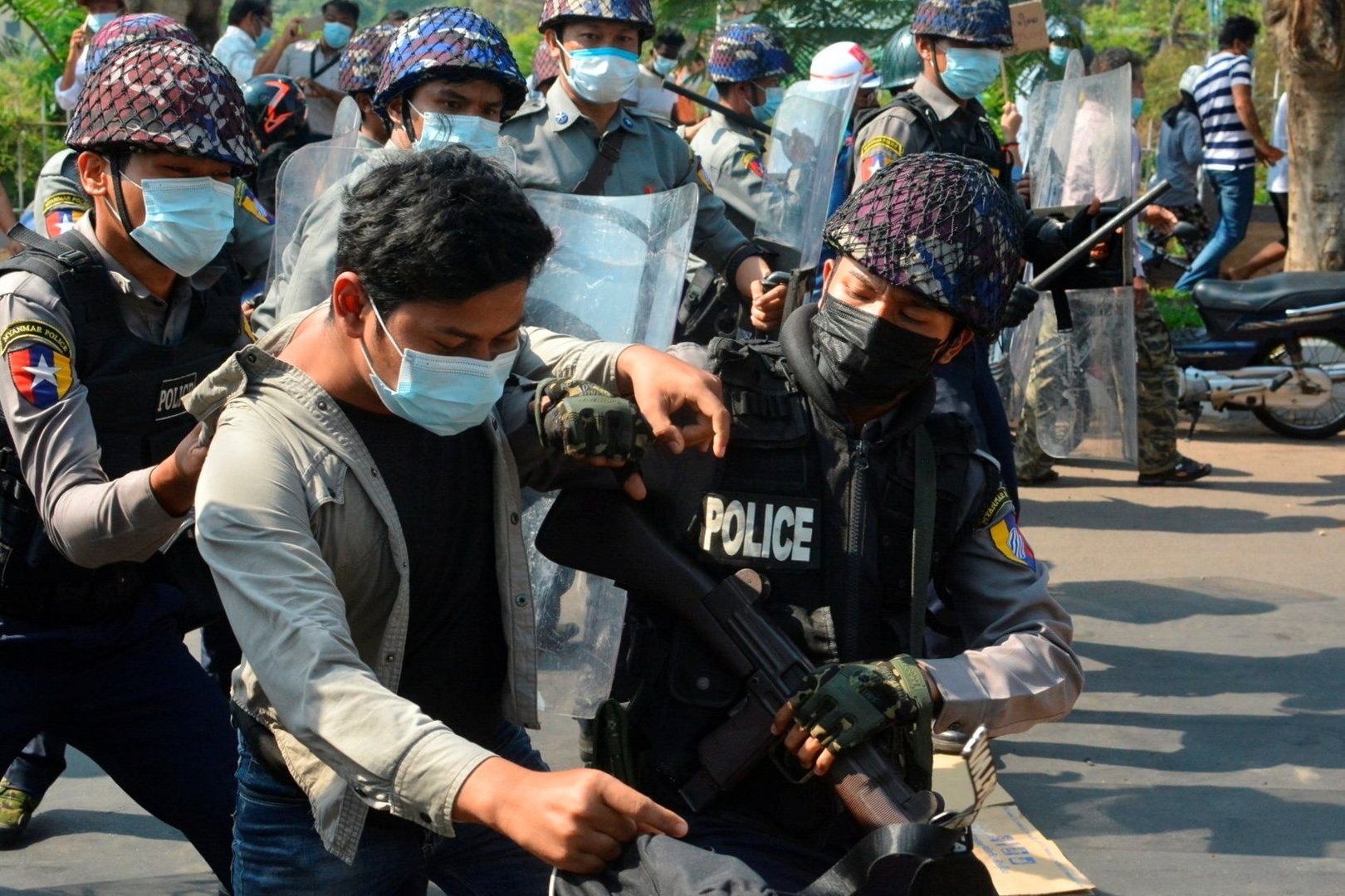 image Myanmar police fire rubber bullets, wounding three, as hundreds of thousands protest