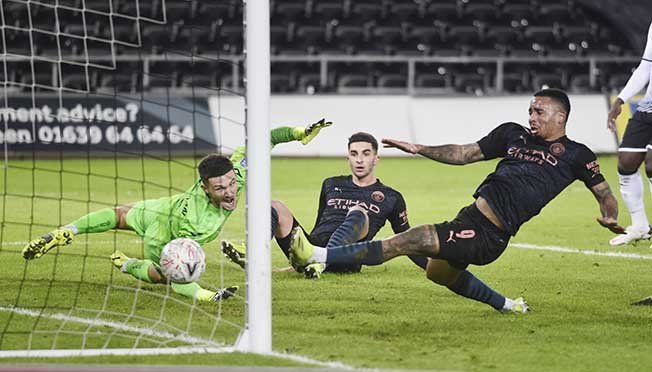 image Man City see off Swansea to rack up record 15th straight win