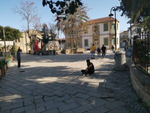 feature agnieska boys play football in a quiet central square