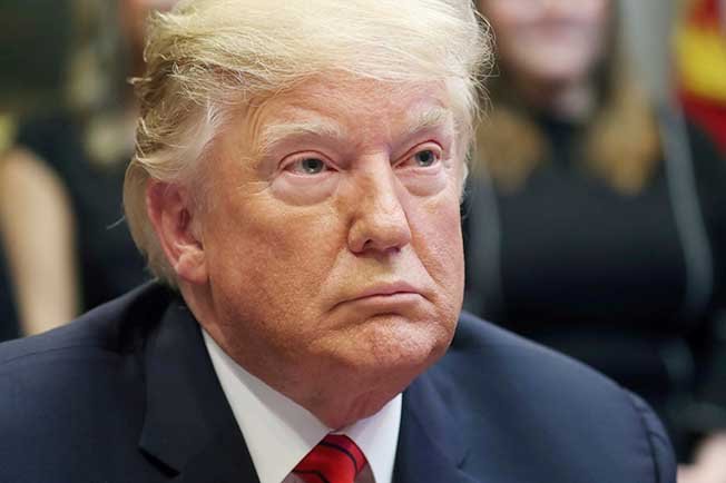 image Biden’s Justice Dept may defend Trump in Capitol riot lawsuits