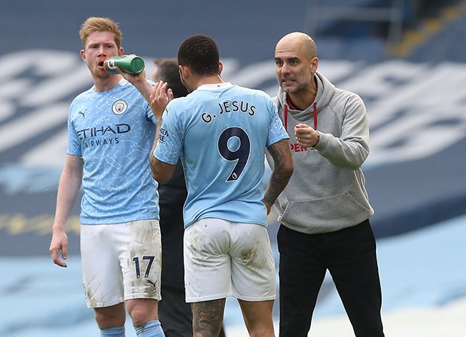 image Guardiola says players will be dropped if they think title race is over