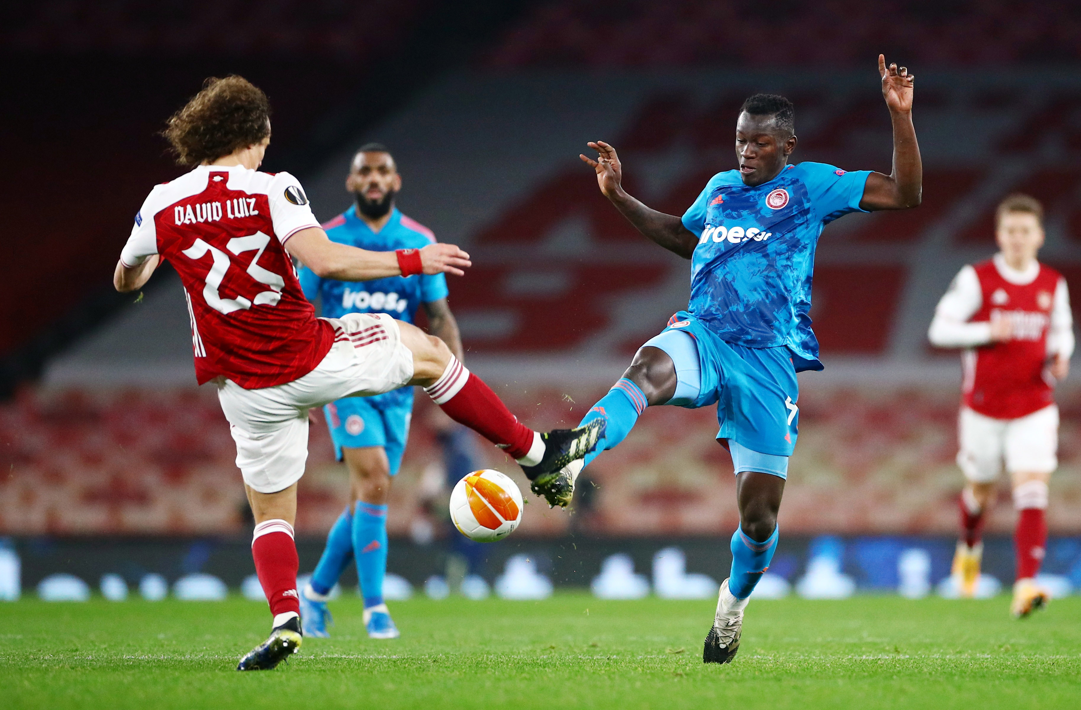 image Arsenal reach last eight despite defeat by Olympiakos