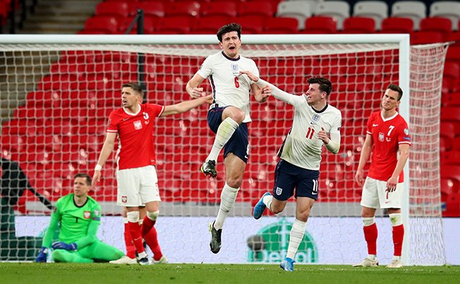 image Maguire rescues England against Poland, Germany stunned by N. Macedonia