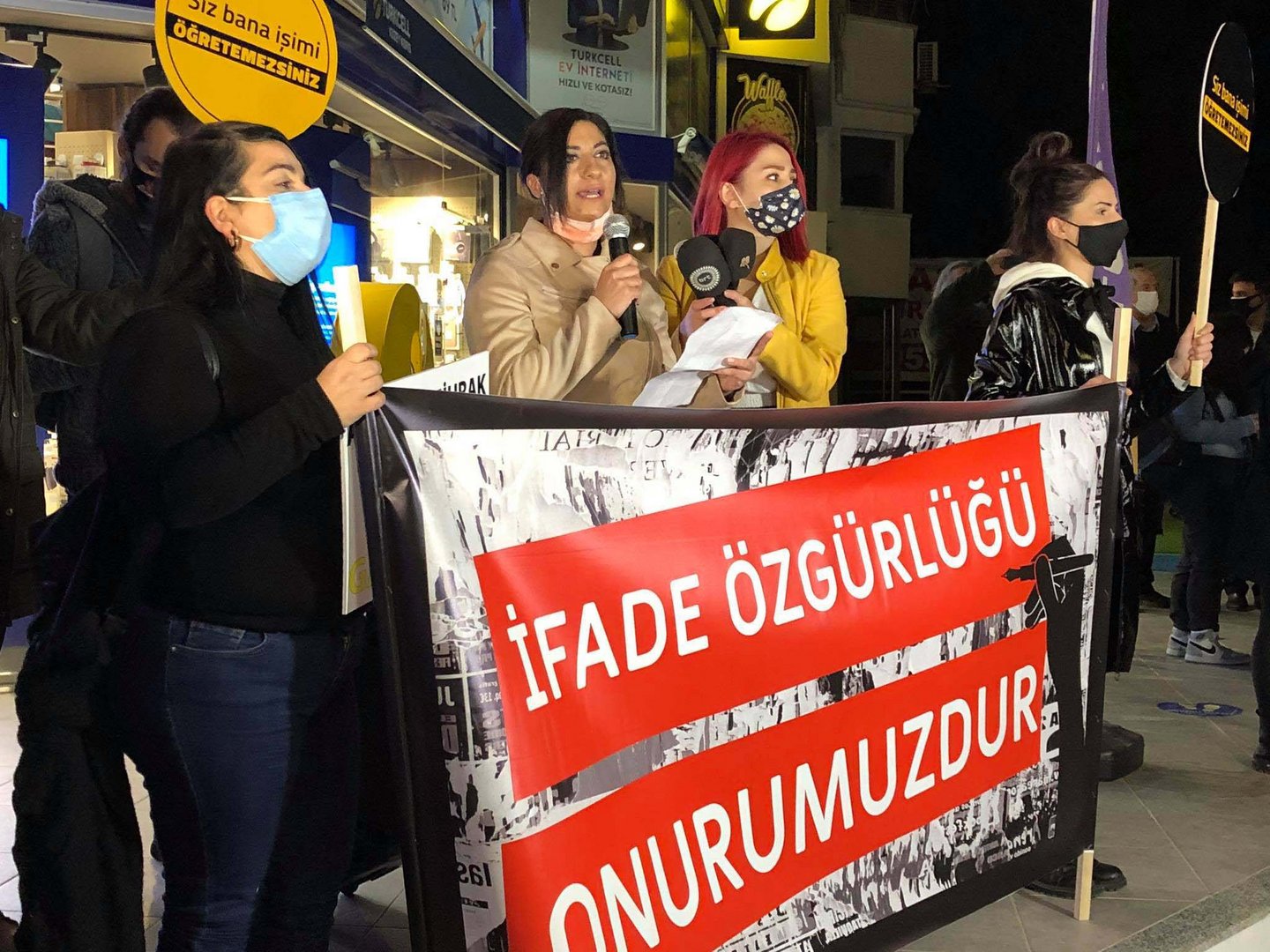 image Journalists and supporters protest in the north