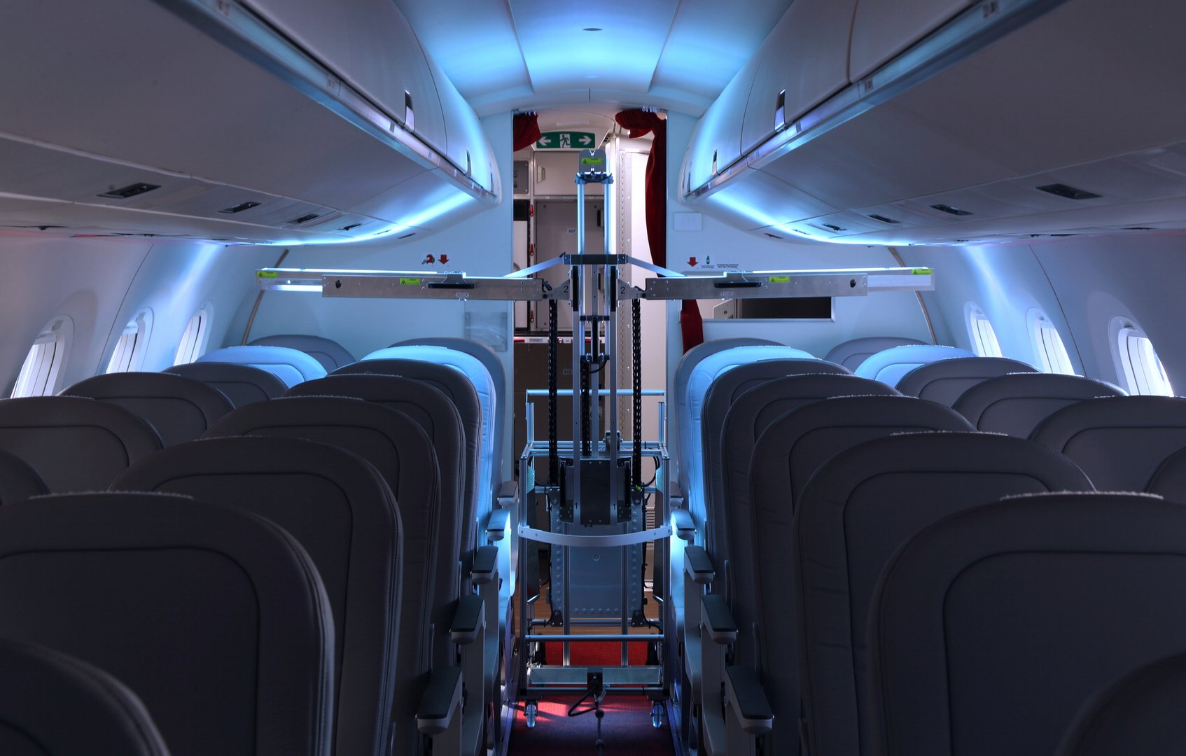 image Swiss robots use UV light to zap viruses aboard passenger planes