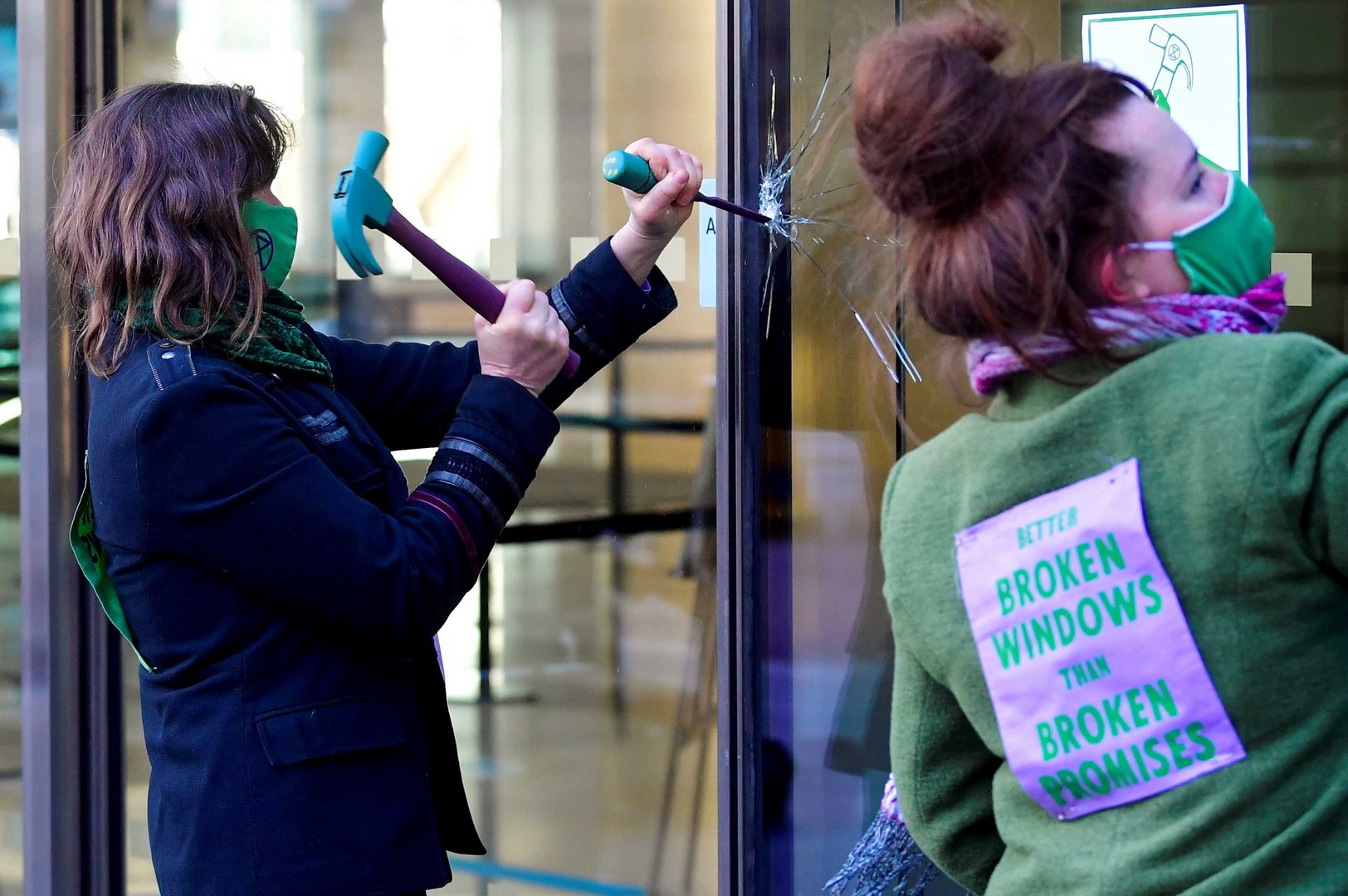 image Climate protesters damage Barclays London HQ, seven arrested