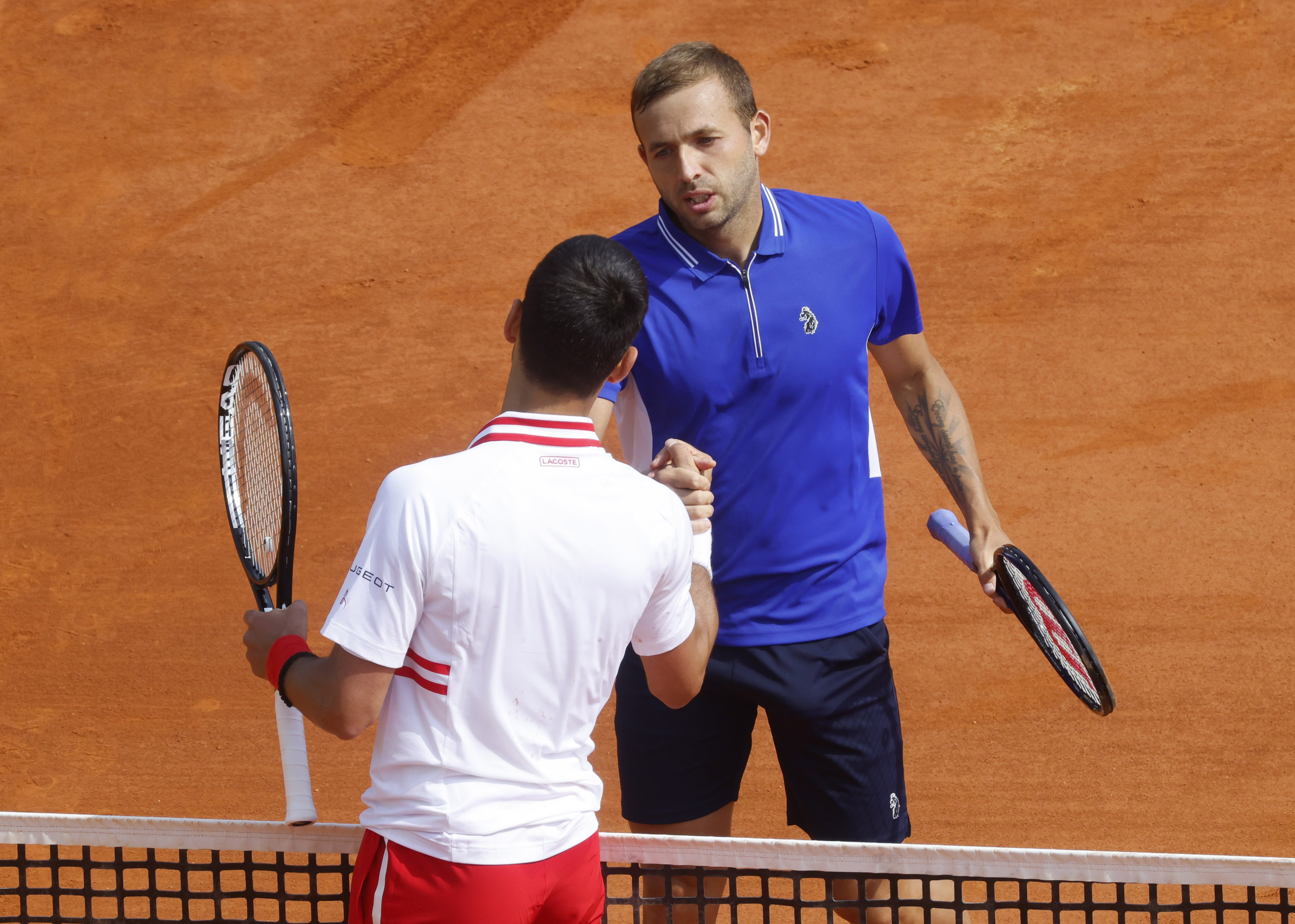 image Evans stuns Djokovic to reach Monte-Carlo quarter-finals