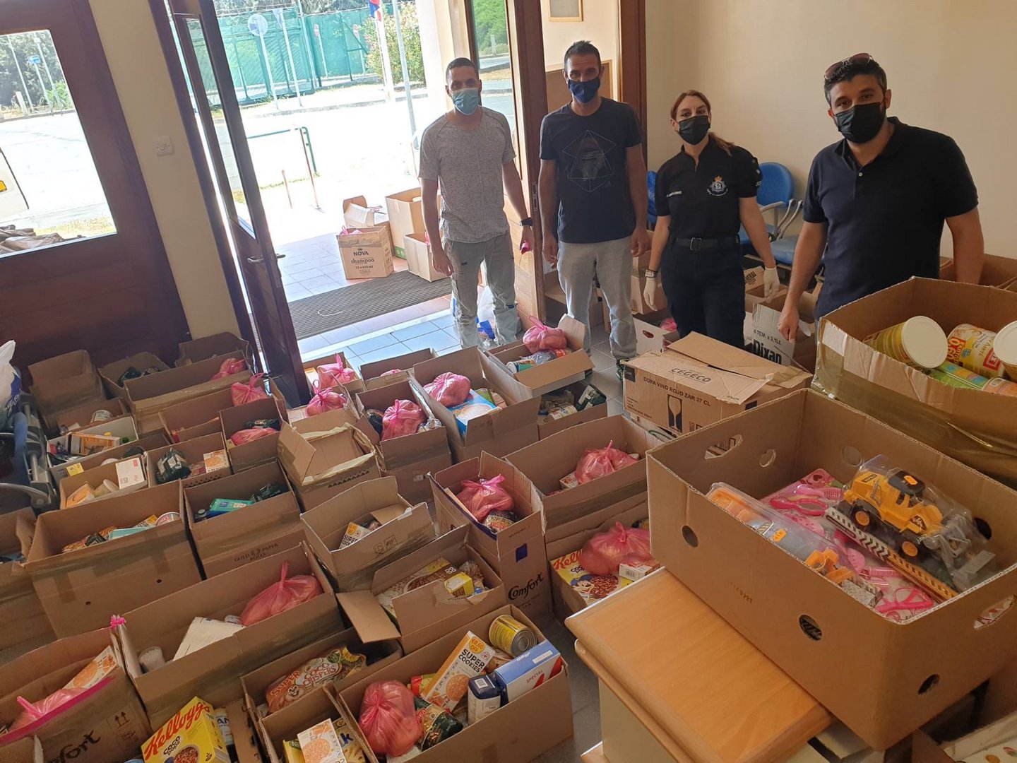 image SBA Police Community Units distribute food to families in need