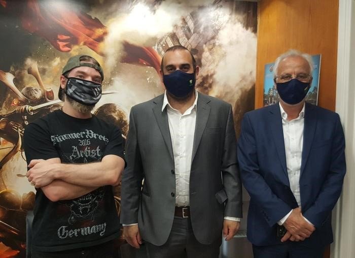 image Karousos visits merch warehouse of Swedish metal band
