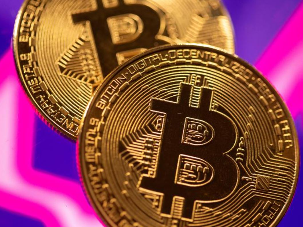 image Bitcoin hits record before landmark Coinbase listing on Nasdaq