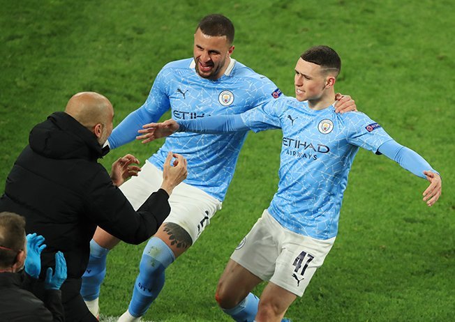 image Man City reach Champions League semis with 2-1 win at Dortmund