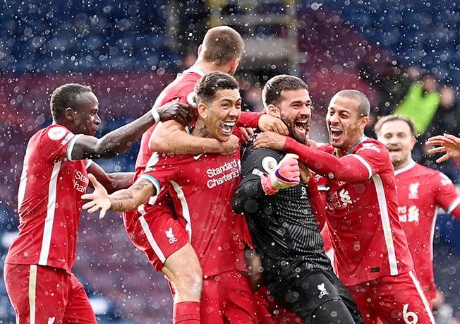 image Keeper Alisson heads Liverpool to last-gasp win