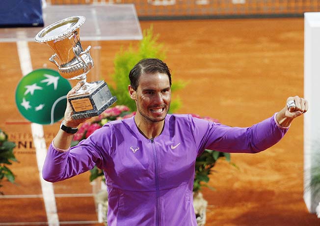 image Nadal overcomes blip to scythe down Djokovic in Rome final