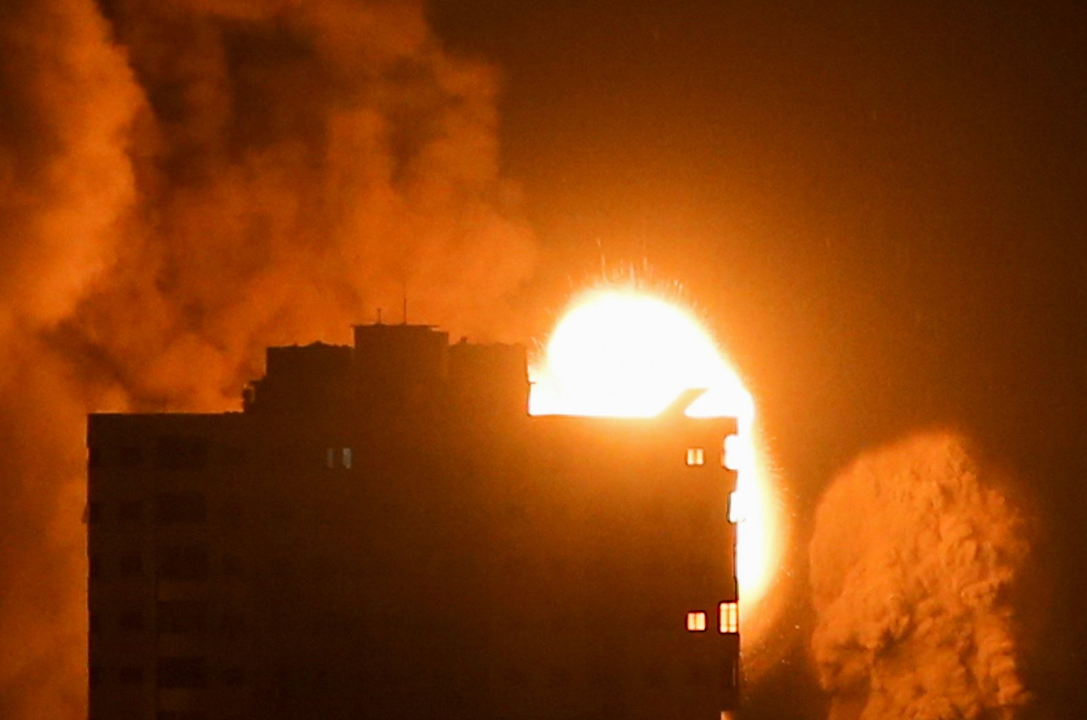 image Israel launches dozens of Gaza strikes as fighting enters second week