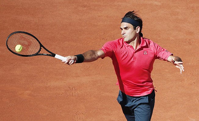 image Federer dazzles on return to Grand Slam action