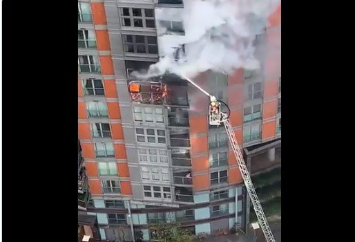 image Firefighters tackle blaze at 19-storey in east London tower block