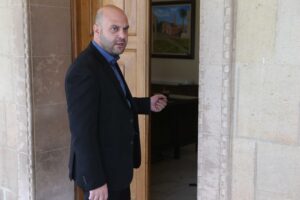 feature george elam party leader christos christou