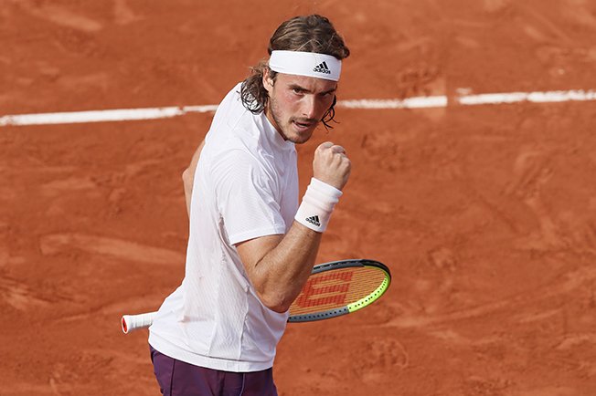image Tsitsipas strolls into third round with win over Martinez
