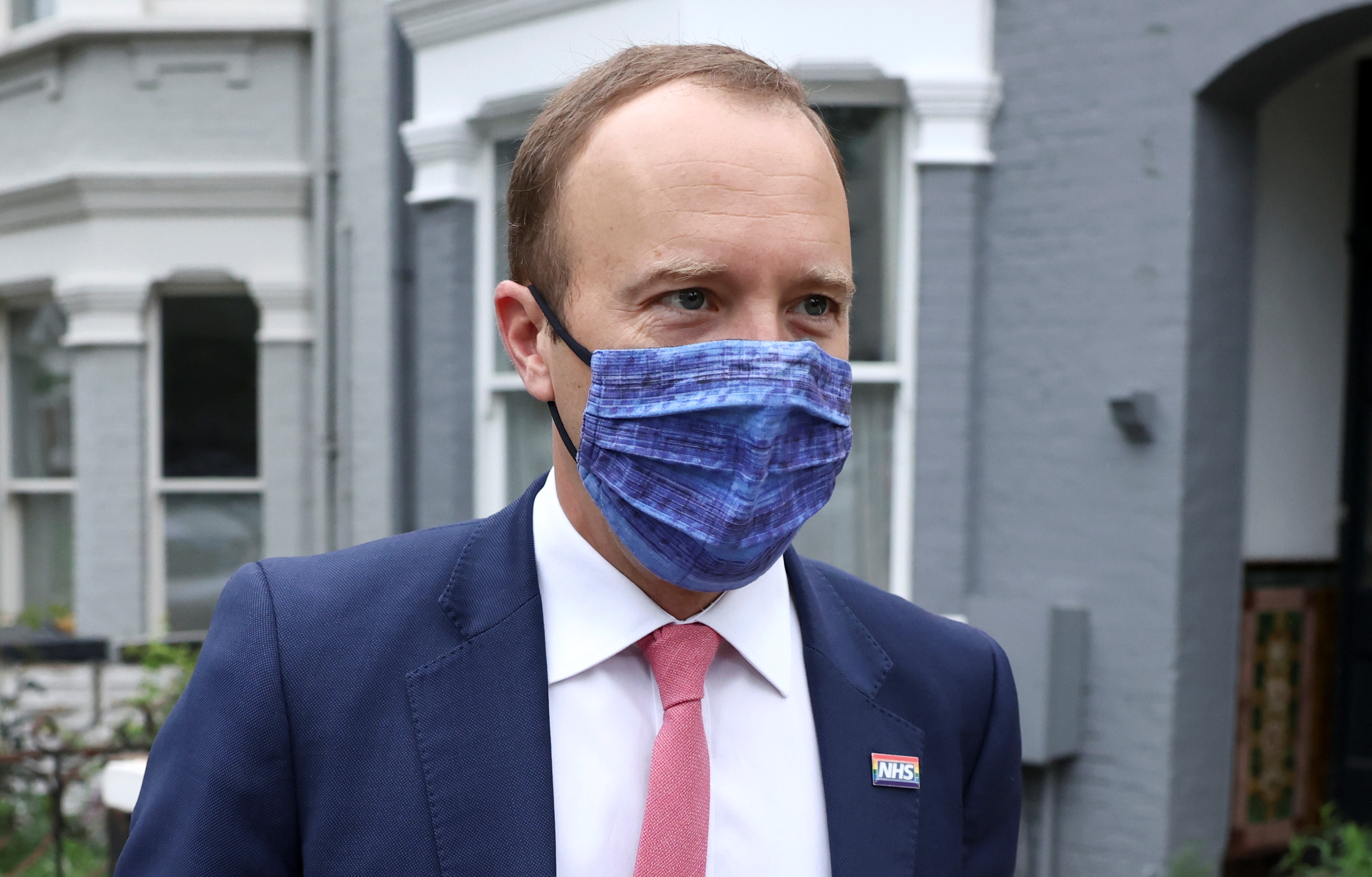 image UK health minister &#8216;very sorry&#8217; after pictured kissing aide