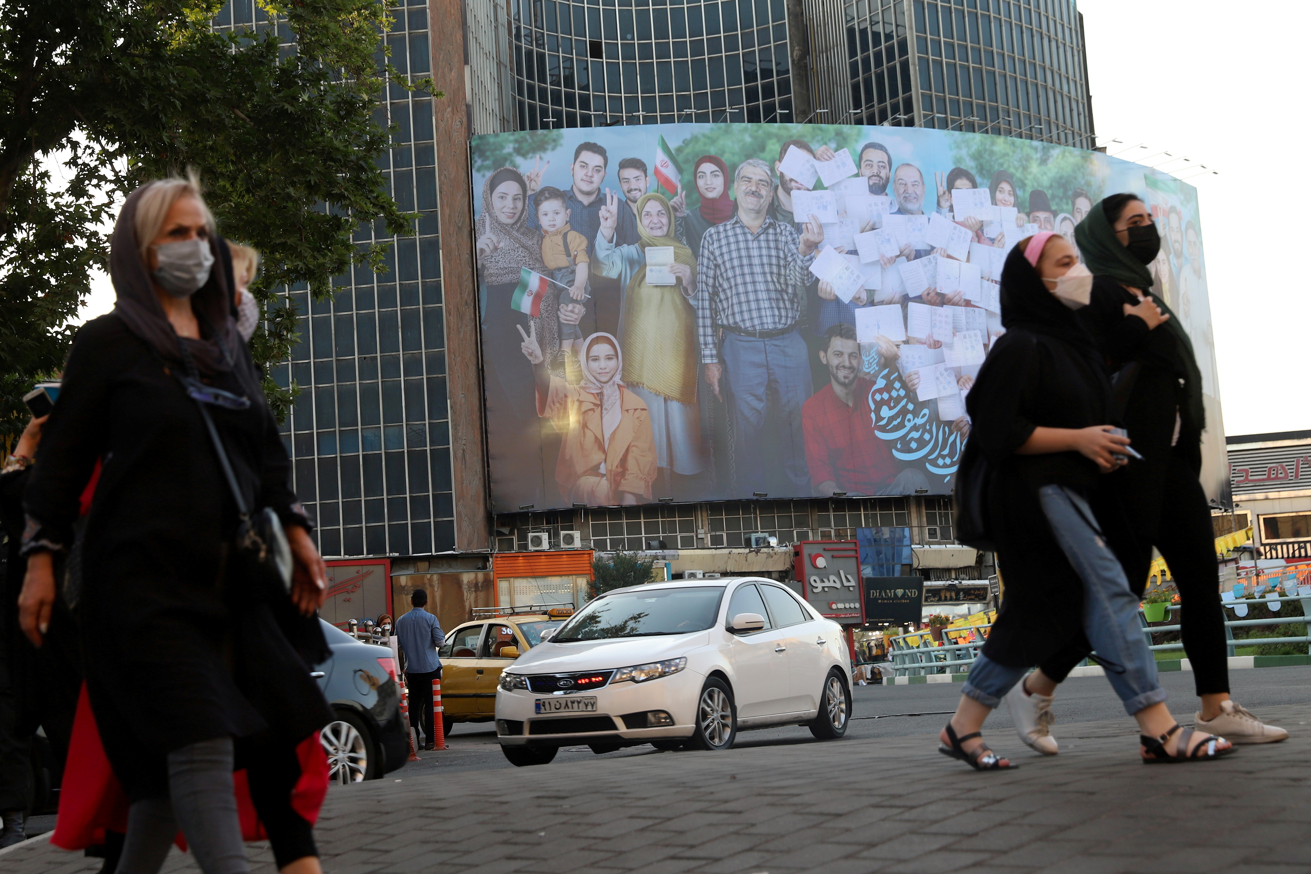 image Iranians vote in election set to hand presidency to hardline judge