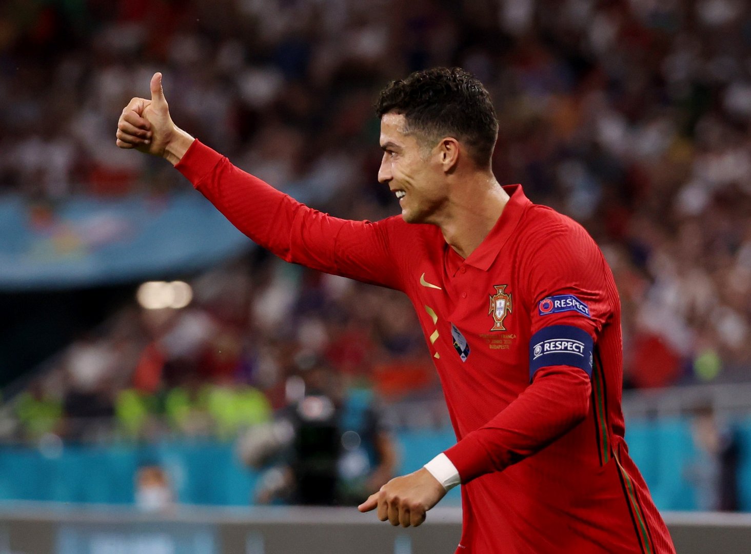 image Portugal squeeze into last 16 after 2-2 draw