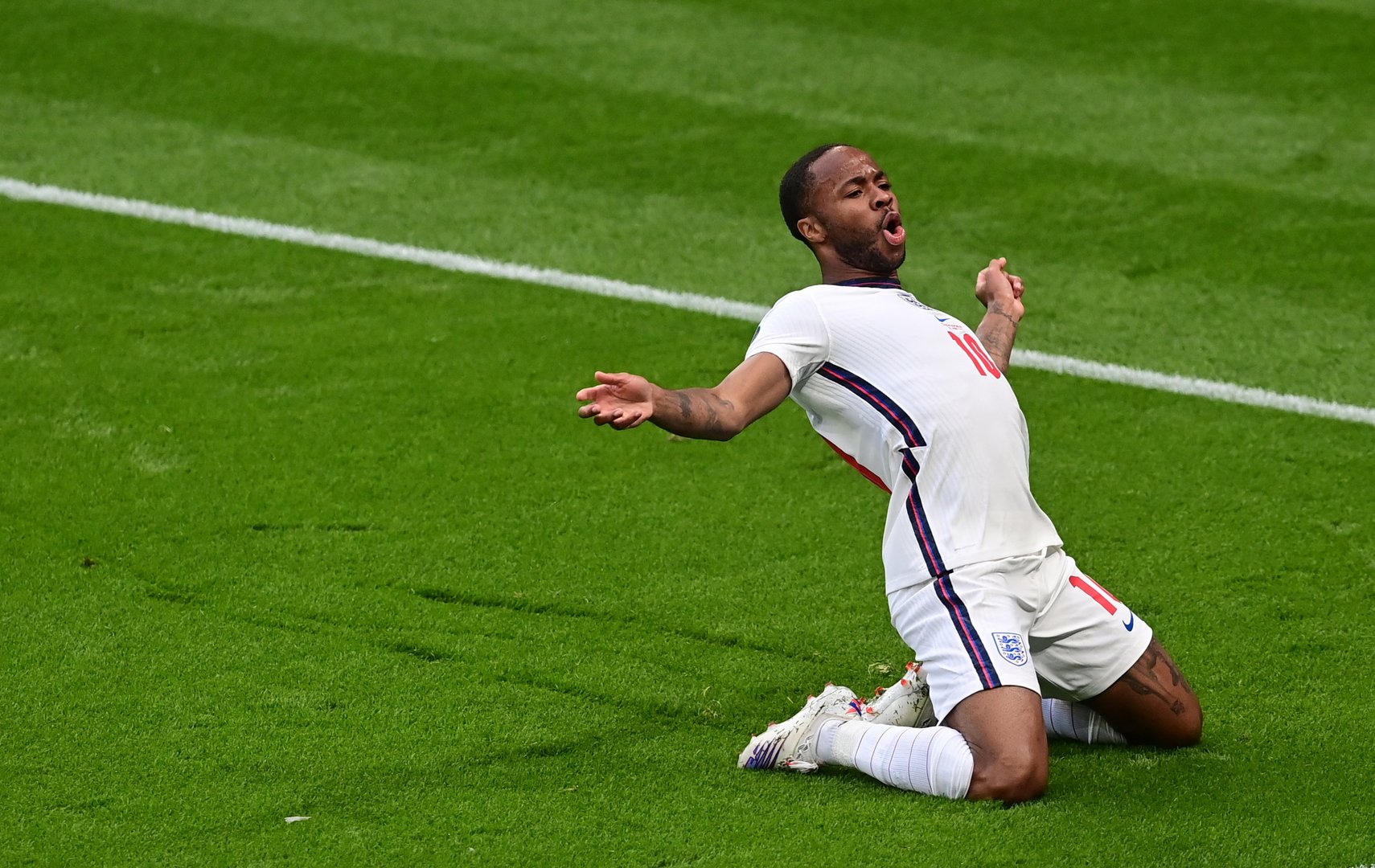 image Early England goal ensures win and top spot in Group D