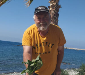 martin martin clark on the coast near zygi promoting wild food gathering sea beet for dolmades