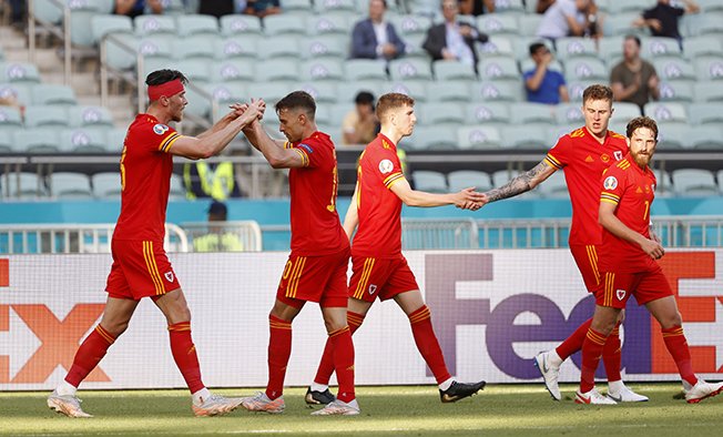 image Moore snatches point for Wales against Switzerland