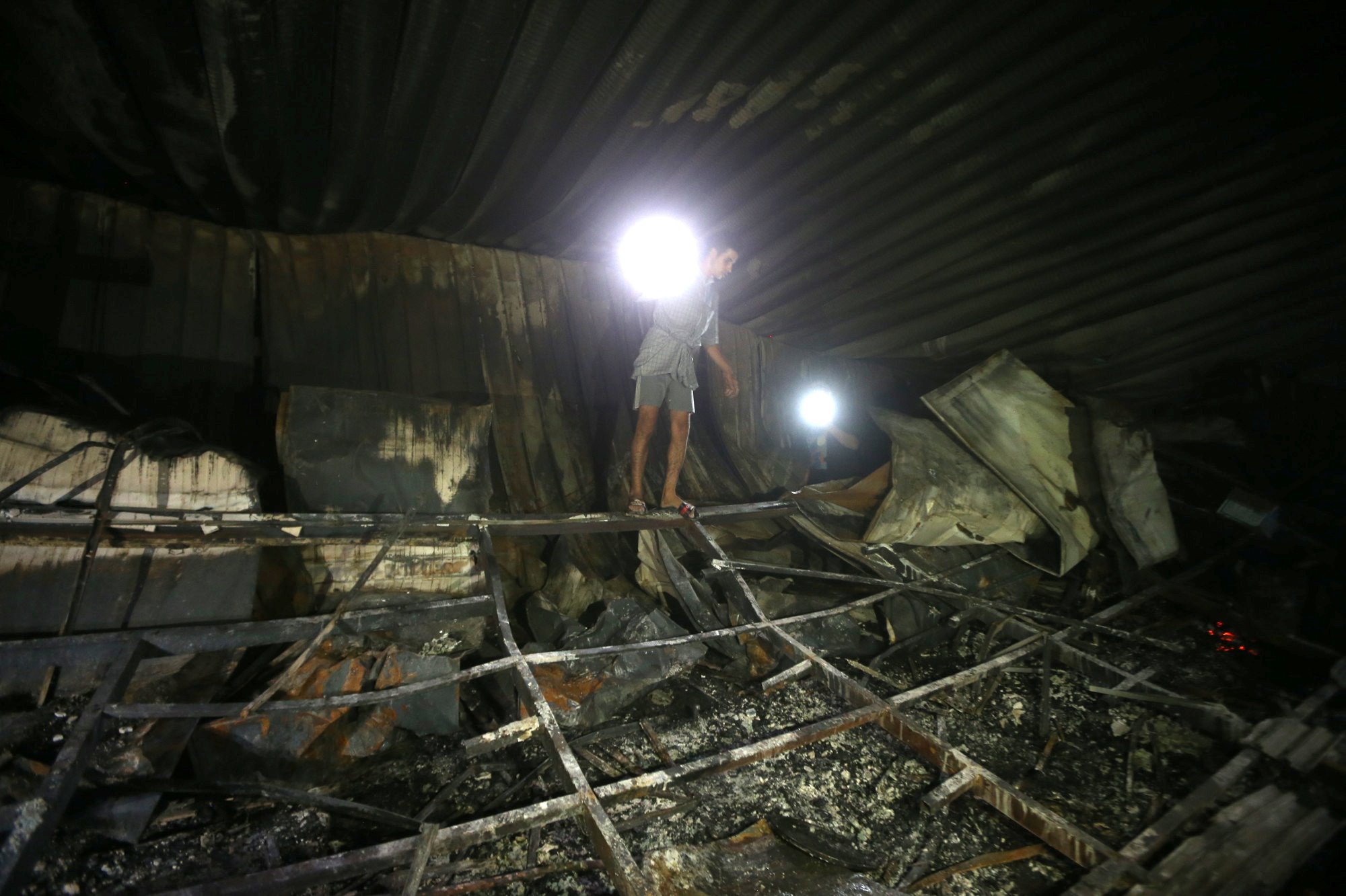 image At least 44 killed in hospital fire in Iraq, China hotel collapse kills eight