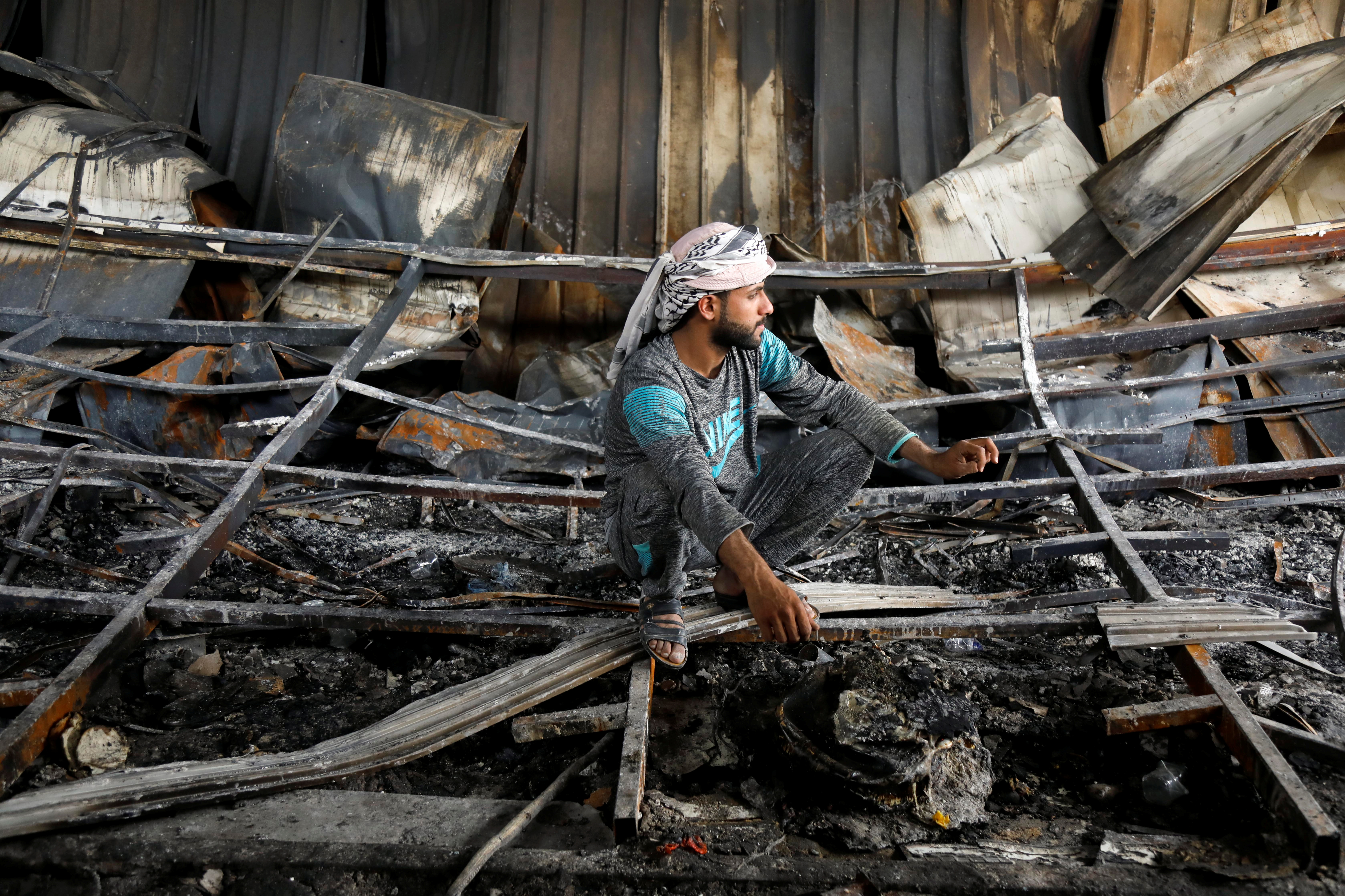 image Anger mounts after 92 die in fire on Iraq COVID ward