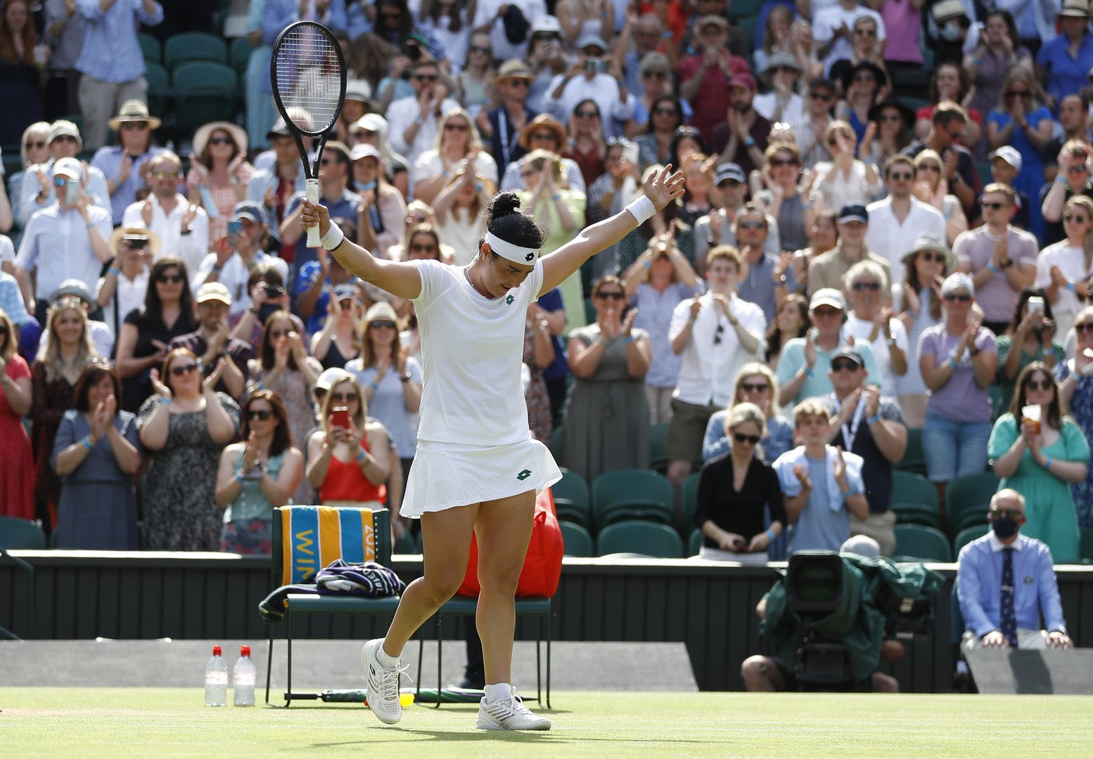 image Jabeur casts spell over Muguruza to reach last 16