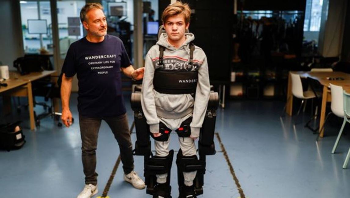 image Father builds exoskeleton to help wheelchair-bound son walk