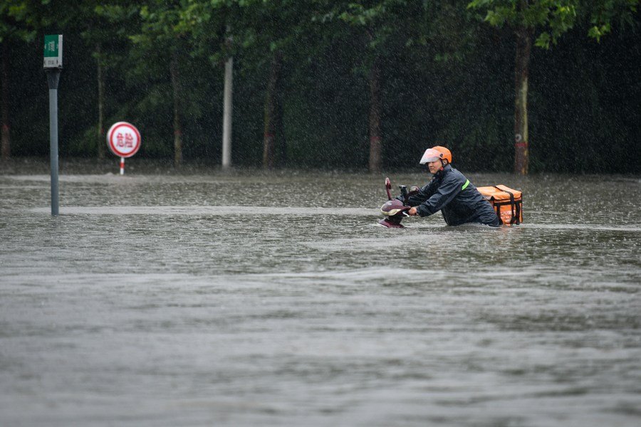 image At least 25 dead as central Chinese province swamped after heaviest rain in 1,000 years (videos)
