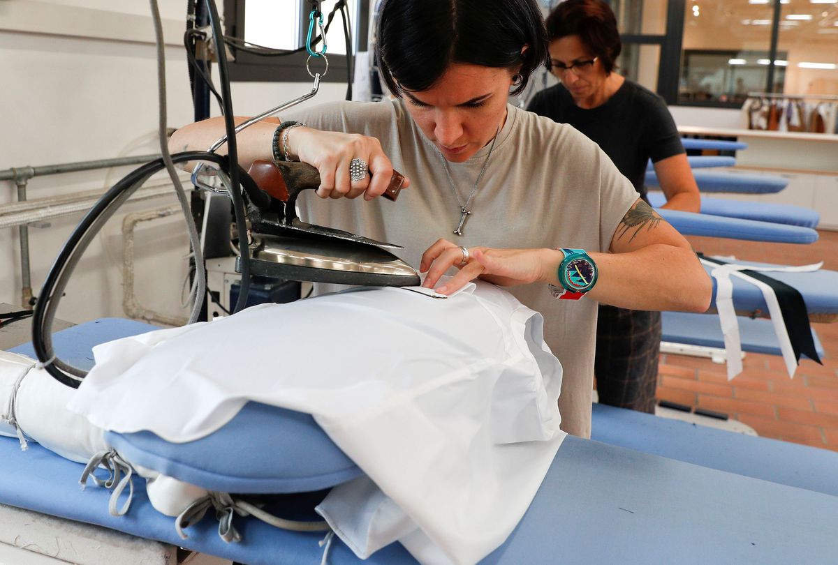image Italian fashion boss offers vaccine holdouts 6 months paid leave